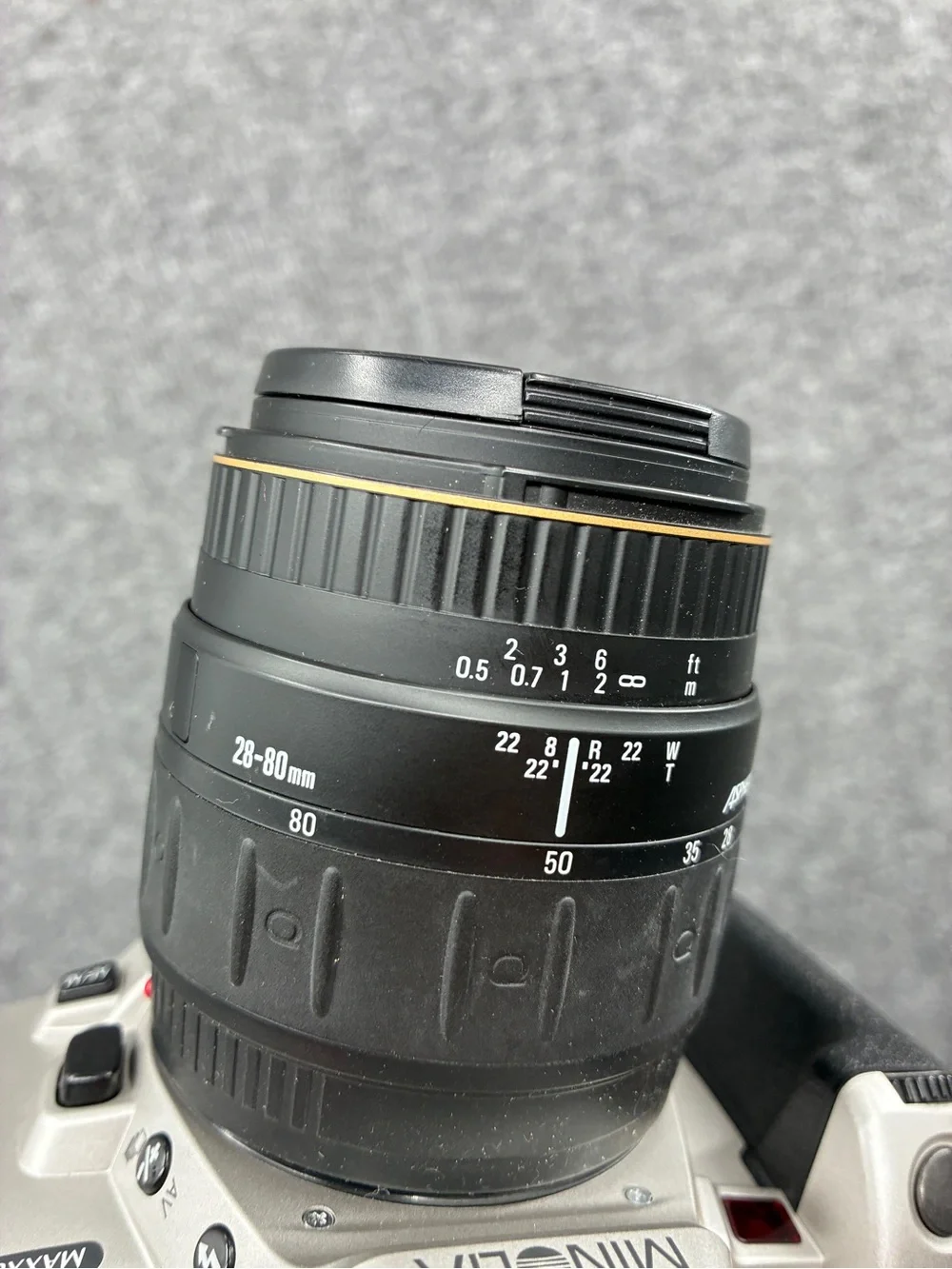 Minolta STsi Silver and Black SLR Film Camera with Quantaray Lens Cap